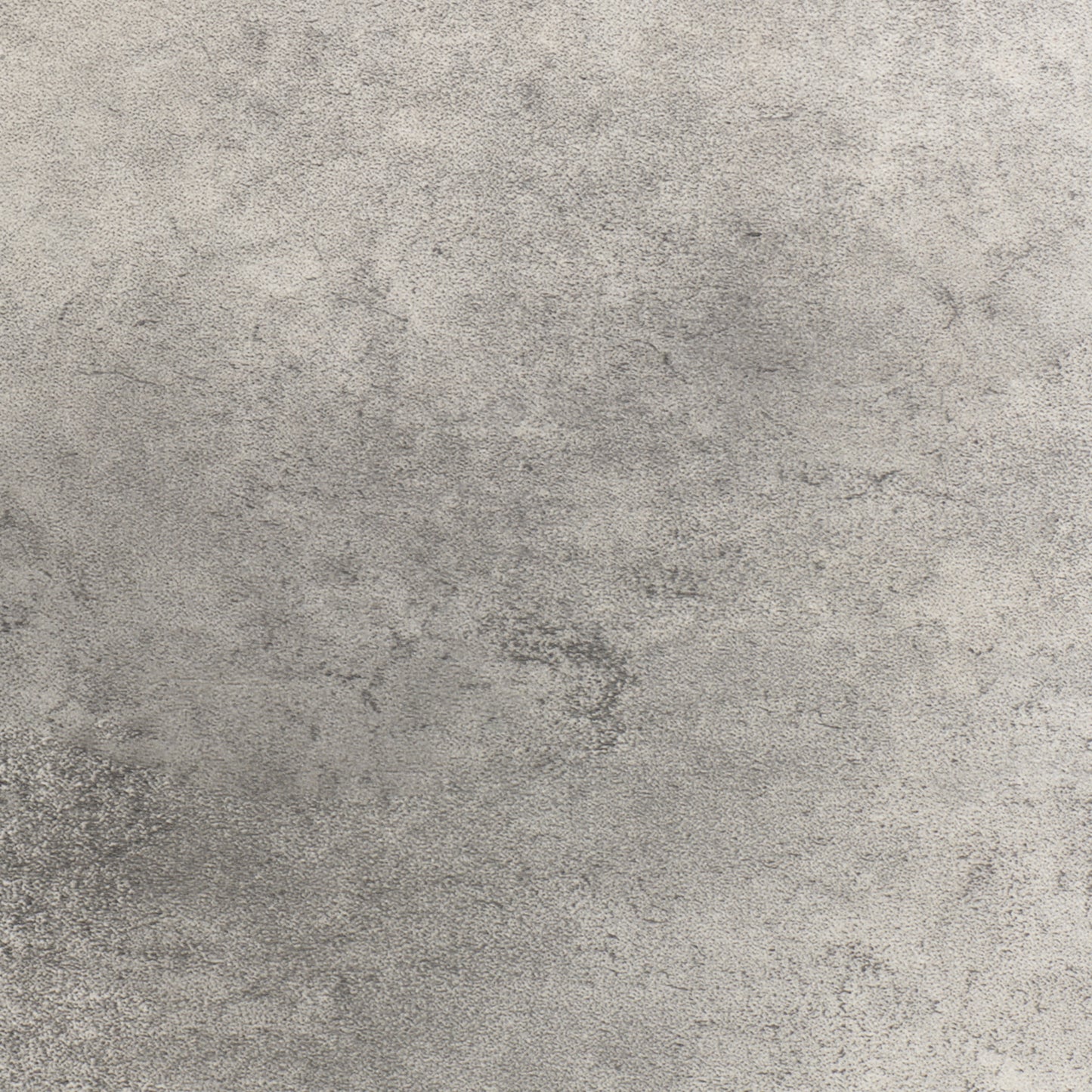 Graue, strukturiert wirkender Bodenbelag in Betonoptik. Der Fokus liegt auf der rauen Textur des Materials.