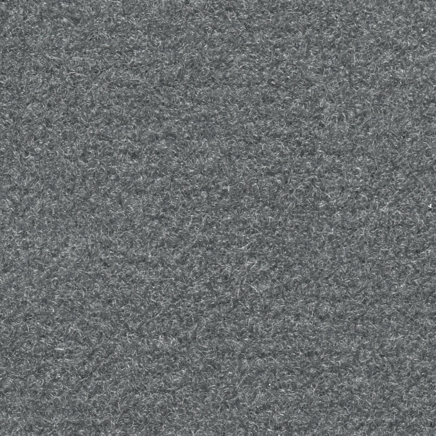 Grauer, strukturierter Teppichboden mit dichter, gleichmässiger Oberfläche. Perfekt für Wohn- und Geschäftsräume. Gibt dem Raum eine neutrale, moderne Ausstrahlung und ist pflegeleicht.
