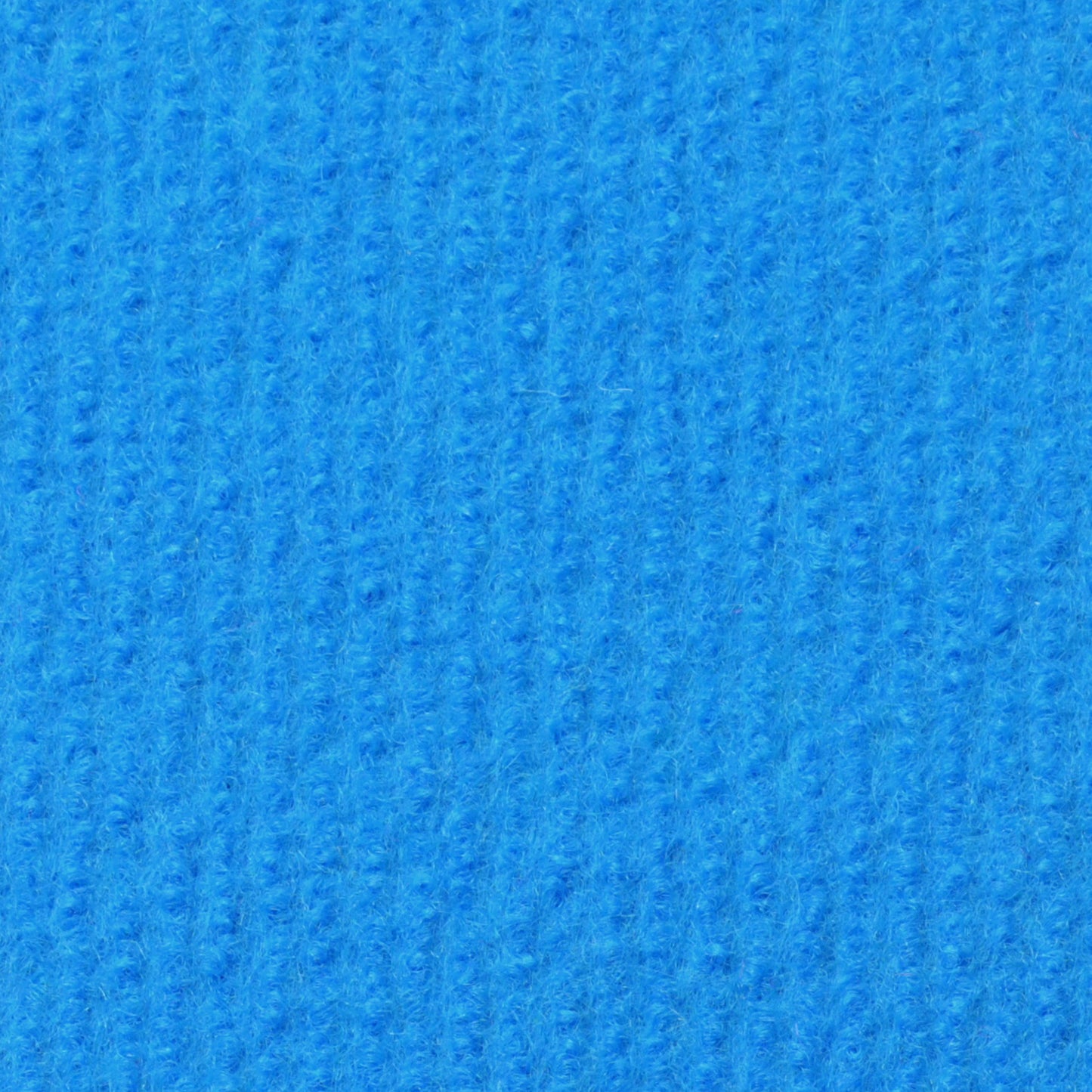 Blauer Teppich in gestrickter Textur mit feiner, gleichmässiger Oberfläche erscheint flach und strukturiert.